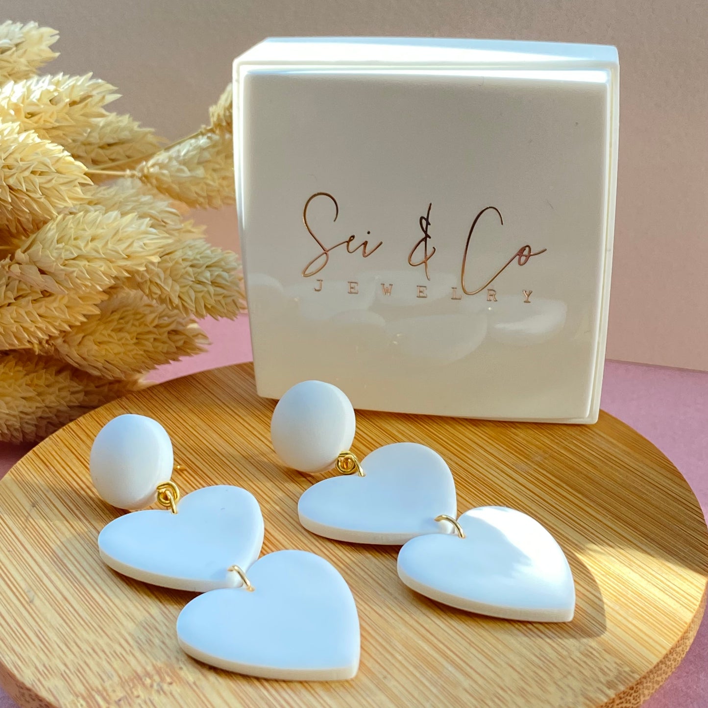 Statement white hearts earrings