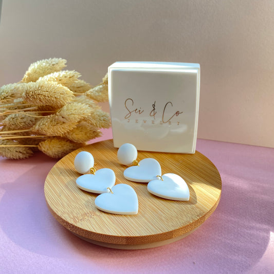 Statement white hearts earrings